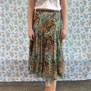 Newsworthy 
Boho print asymmetrical skirt